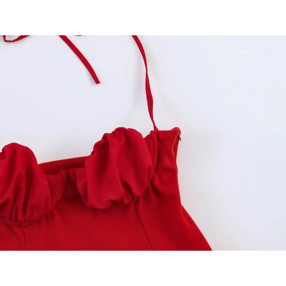 Self red fabric tie wrap halter neck back knot close up