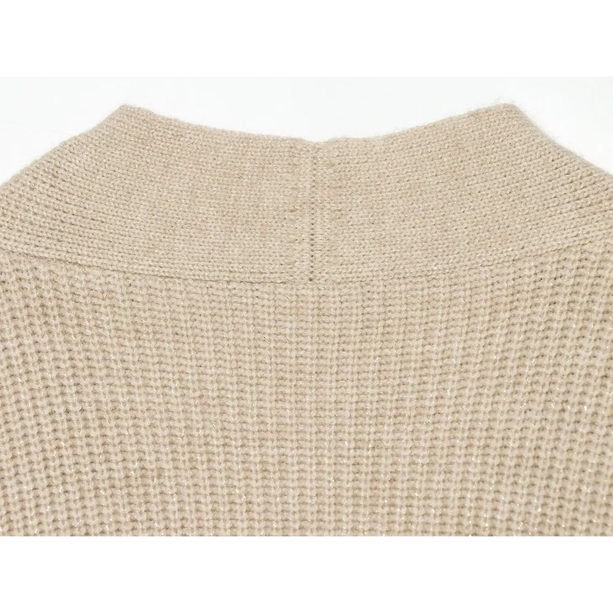 Close-up of center back neck seam and ribbed collar band