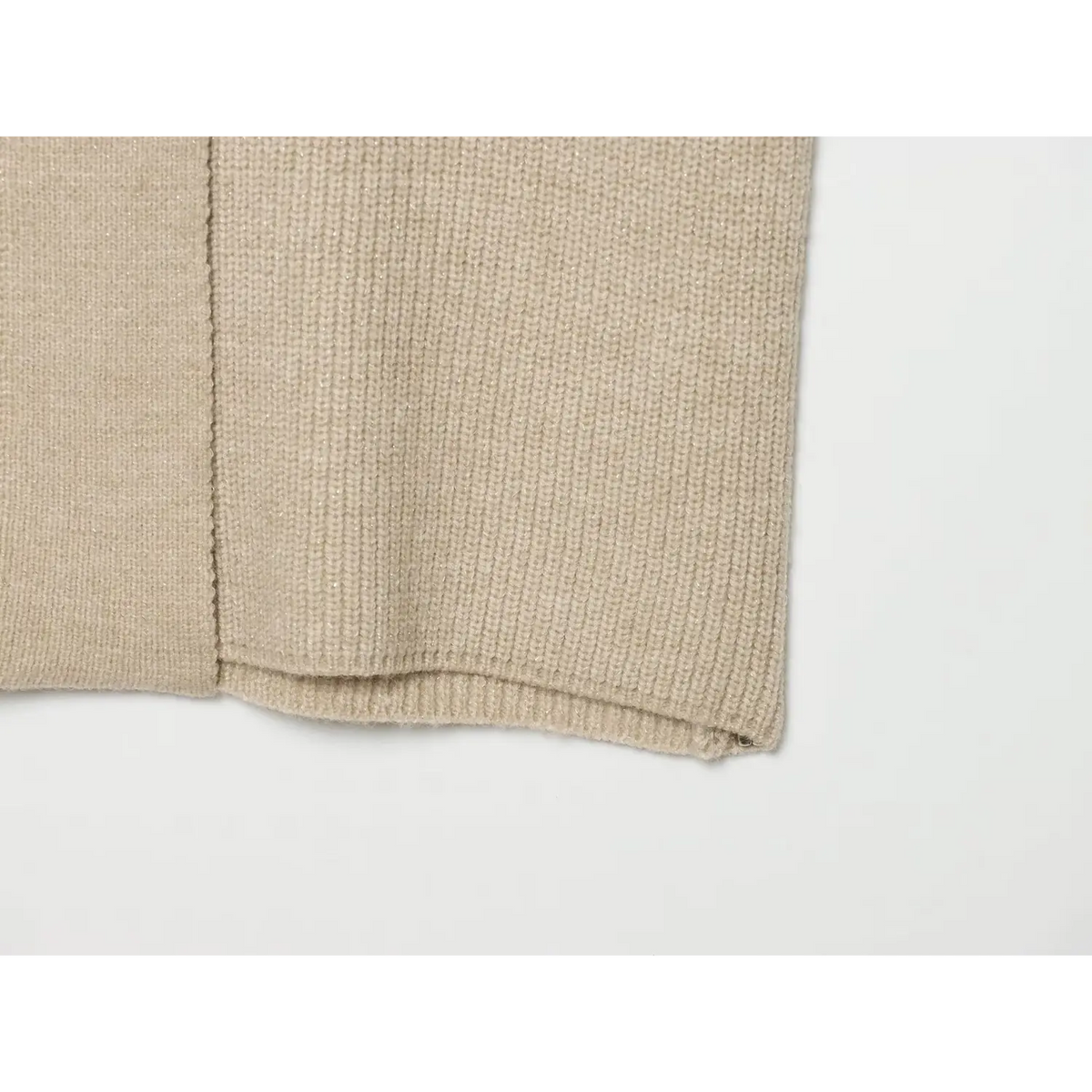Close-up of split hem at side seam
