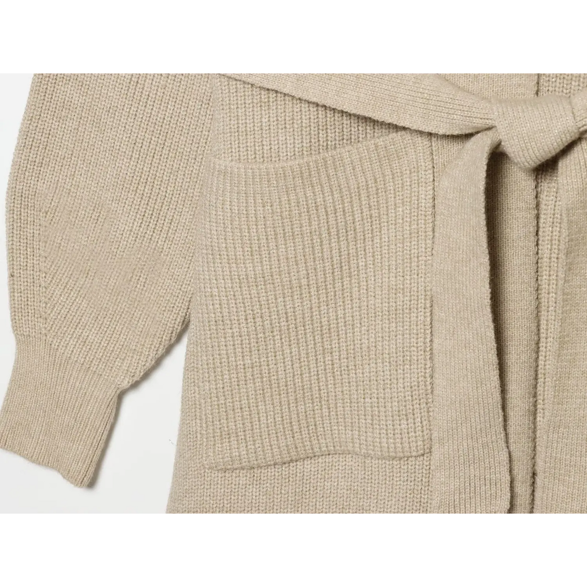 Close-up of rectangular patch pocket and drop shoulder balloon sleeve