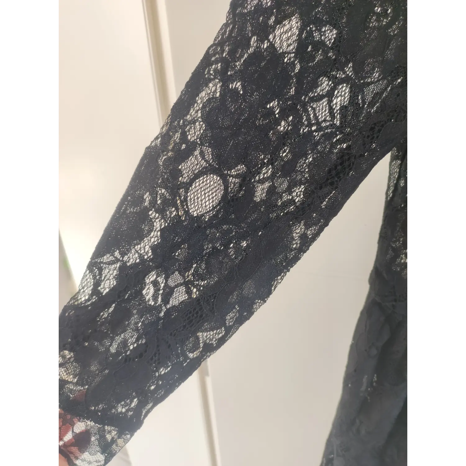 Sheer floral lace three quarter sleeve fabric texture close-up, black vintage lace maxi dress | Detail