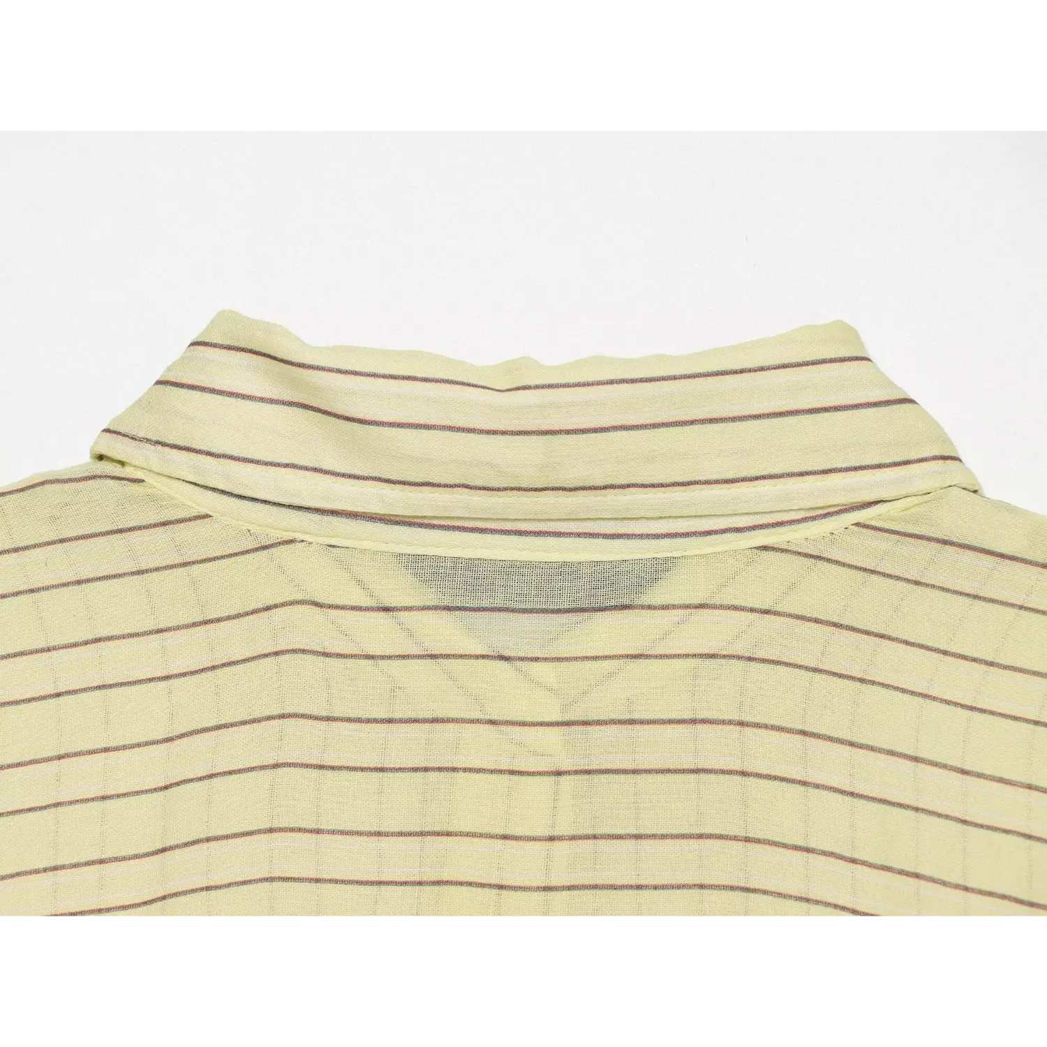 Closeup rear collar & yoke stitching, horizontal/vertical stripe transition detail
