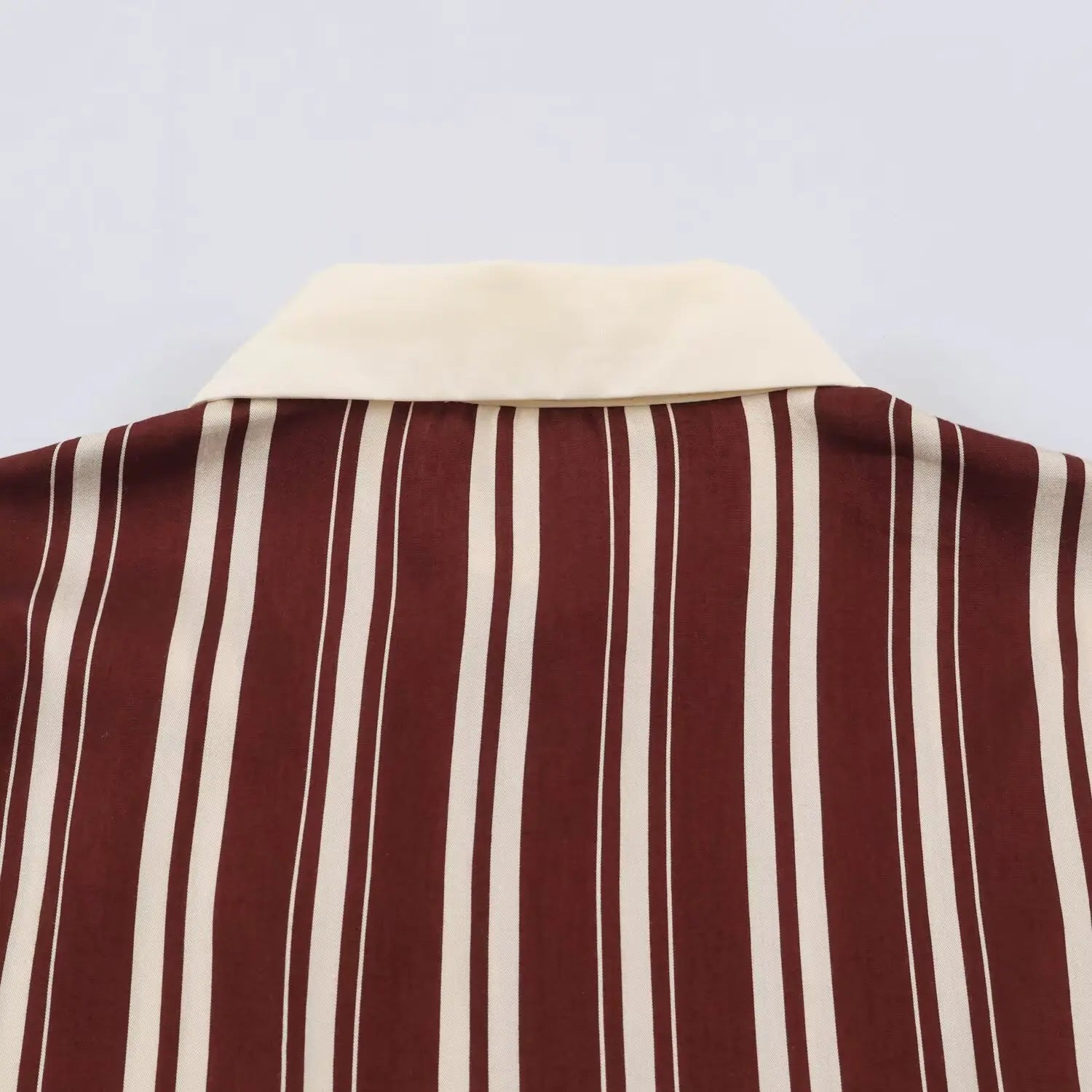 Back view of cream contrast collar on burgundy white vertical stripe maxi dress