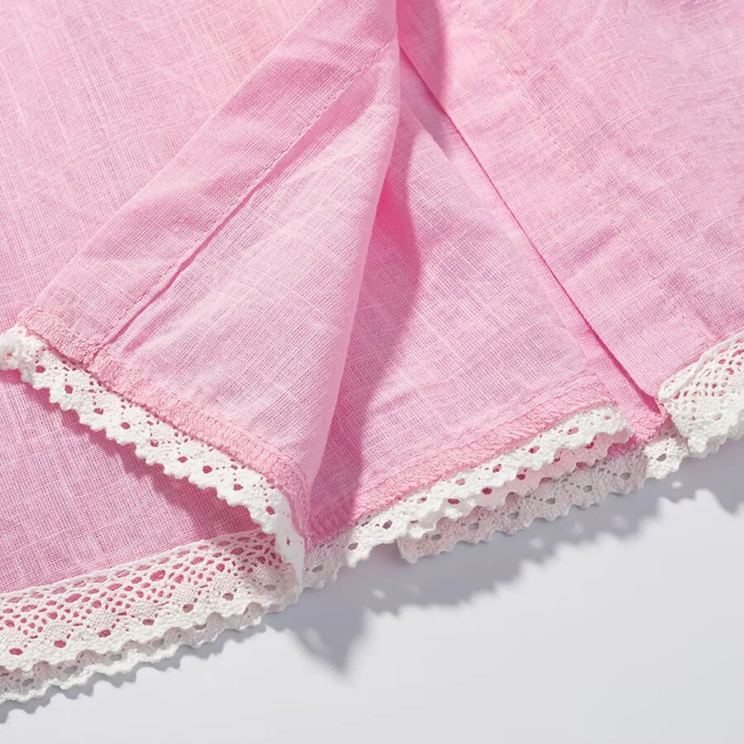 Short pants waistband close-up, wide full elastic gathered waist for comfortable loose fit