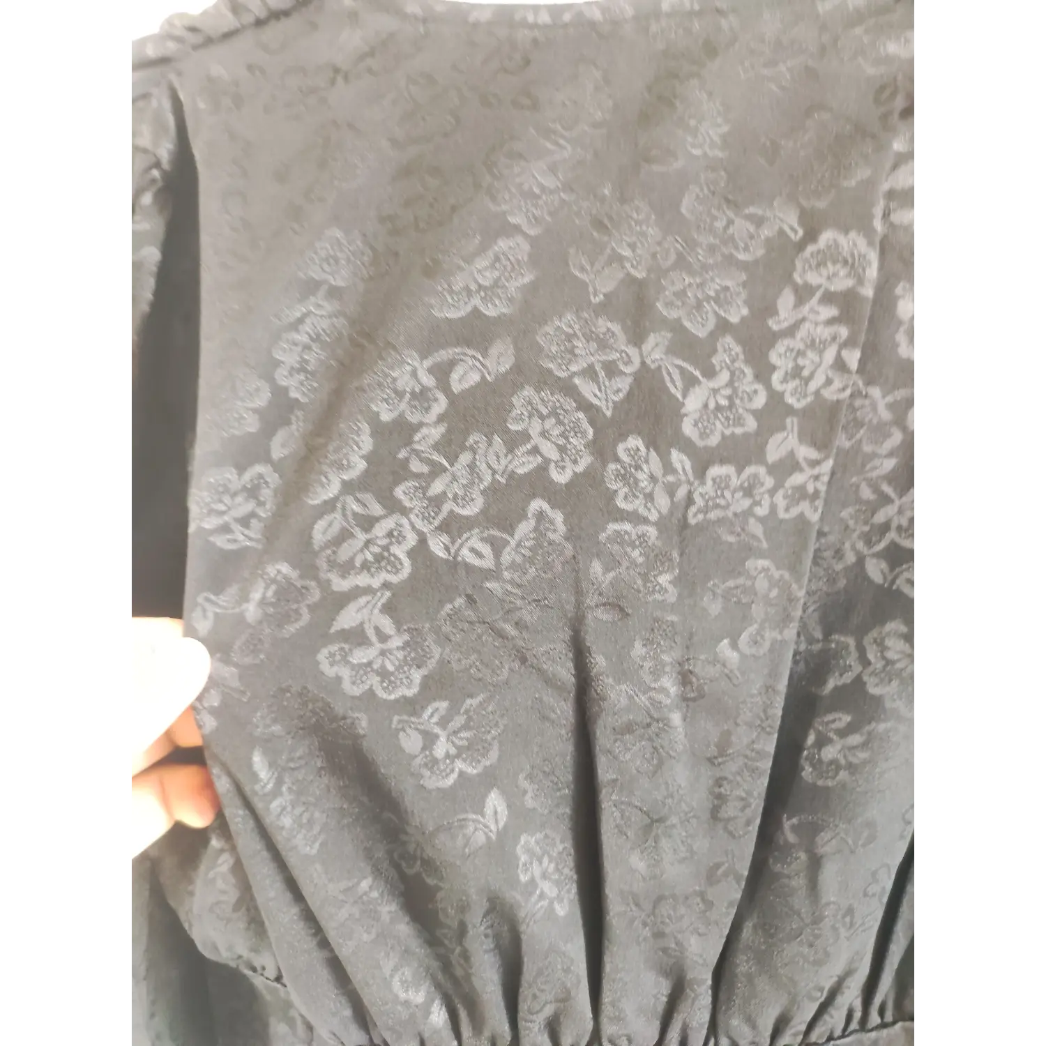 Back shoulder ruched detail, subtle dark flower jacquard textile close-up | Detail