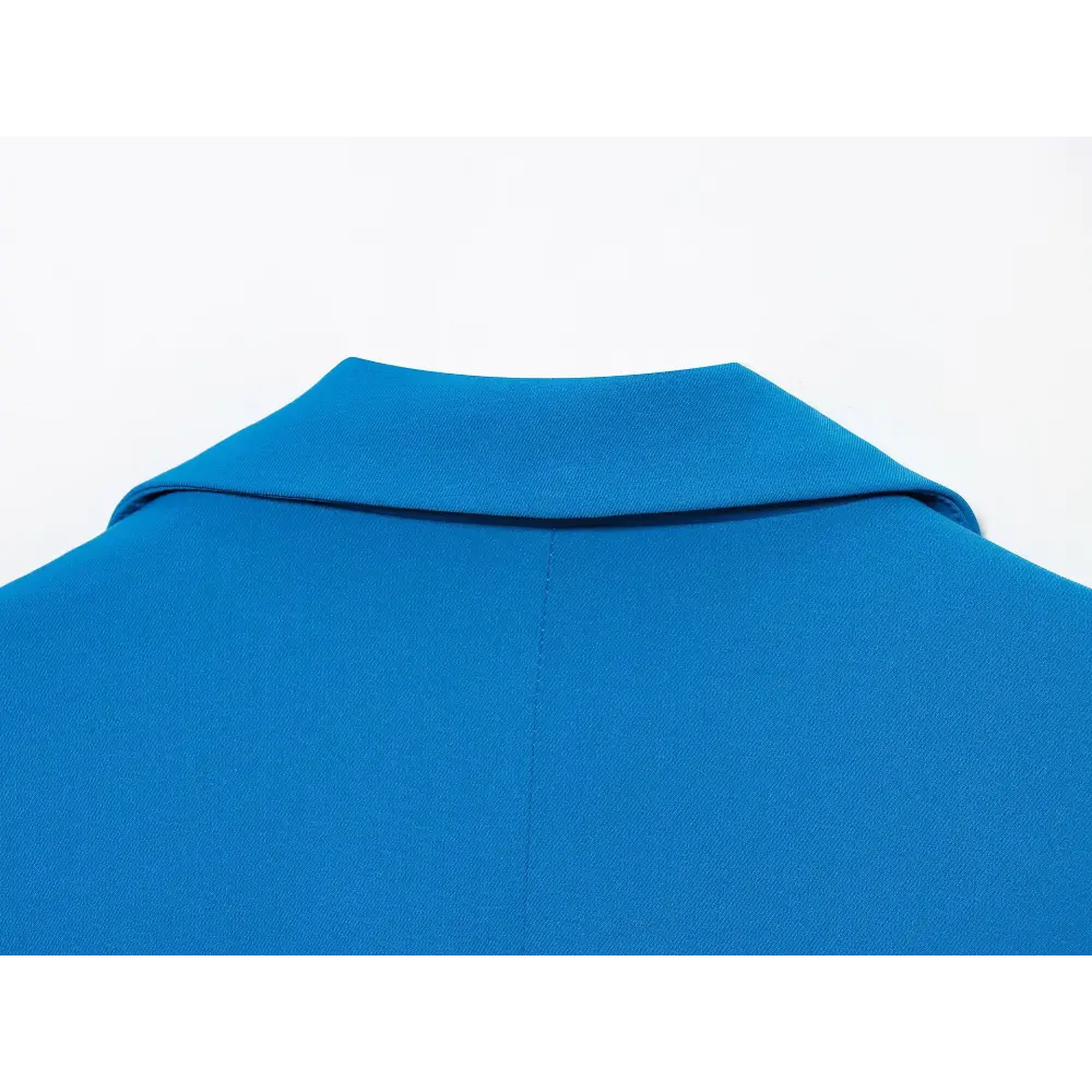 Close-up of blue back collar and center seam