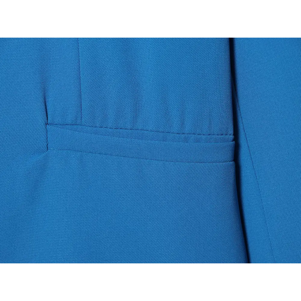 Close-up of blue twill fabric and stitching