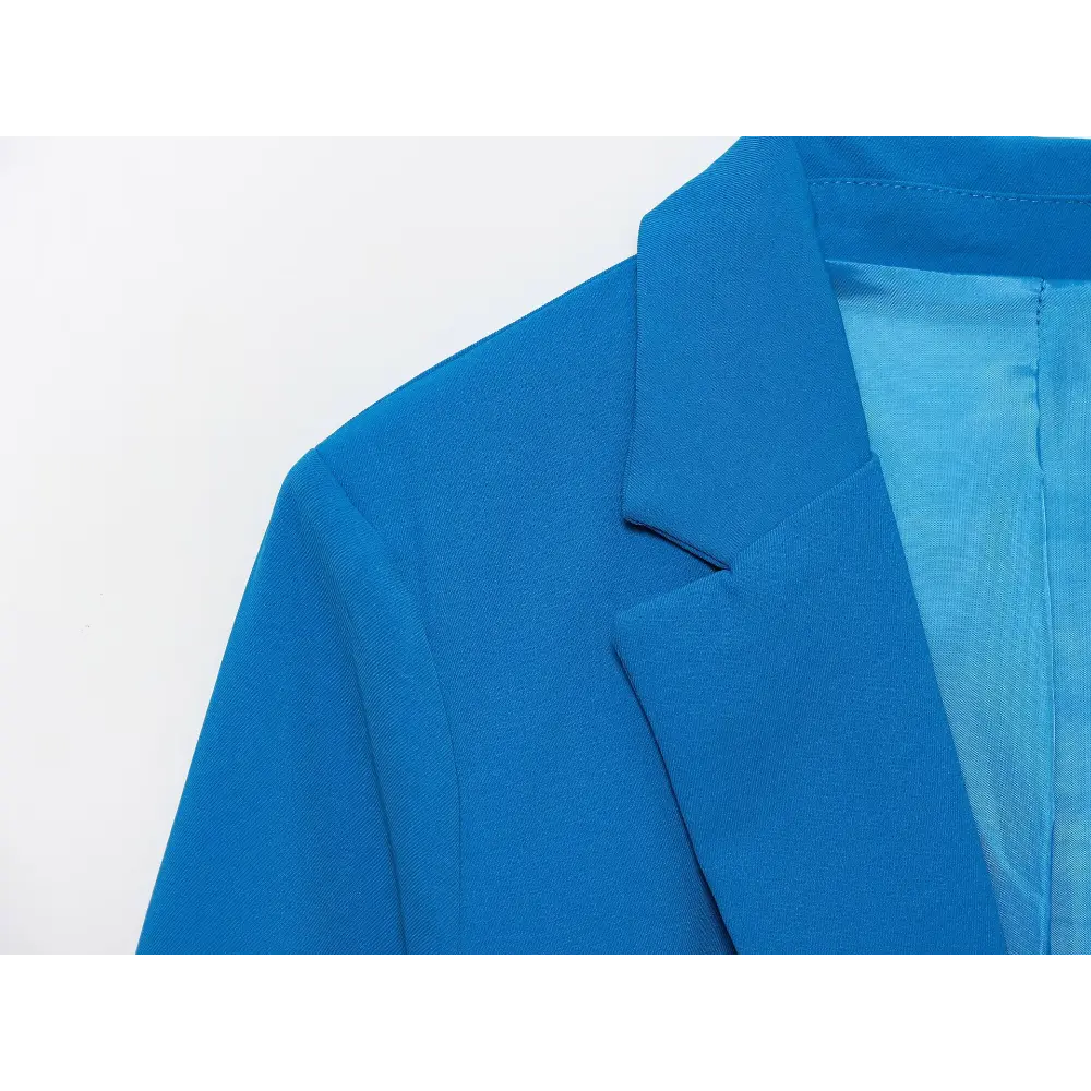 Close-up of blue lapel, shoulder and lining