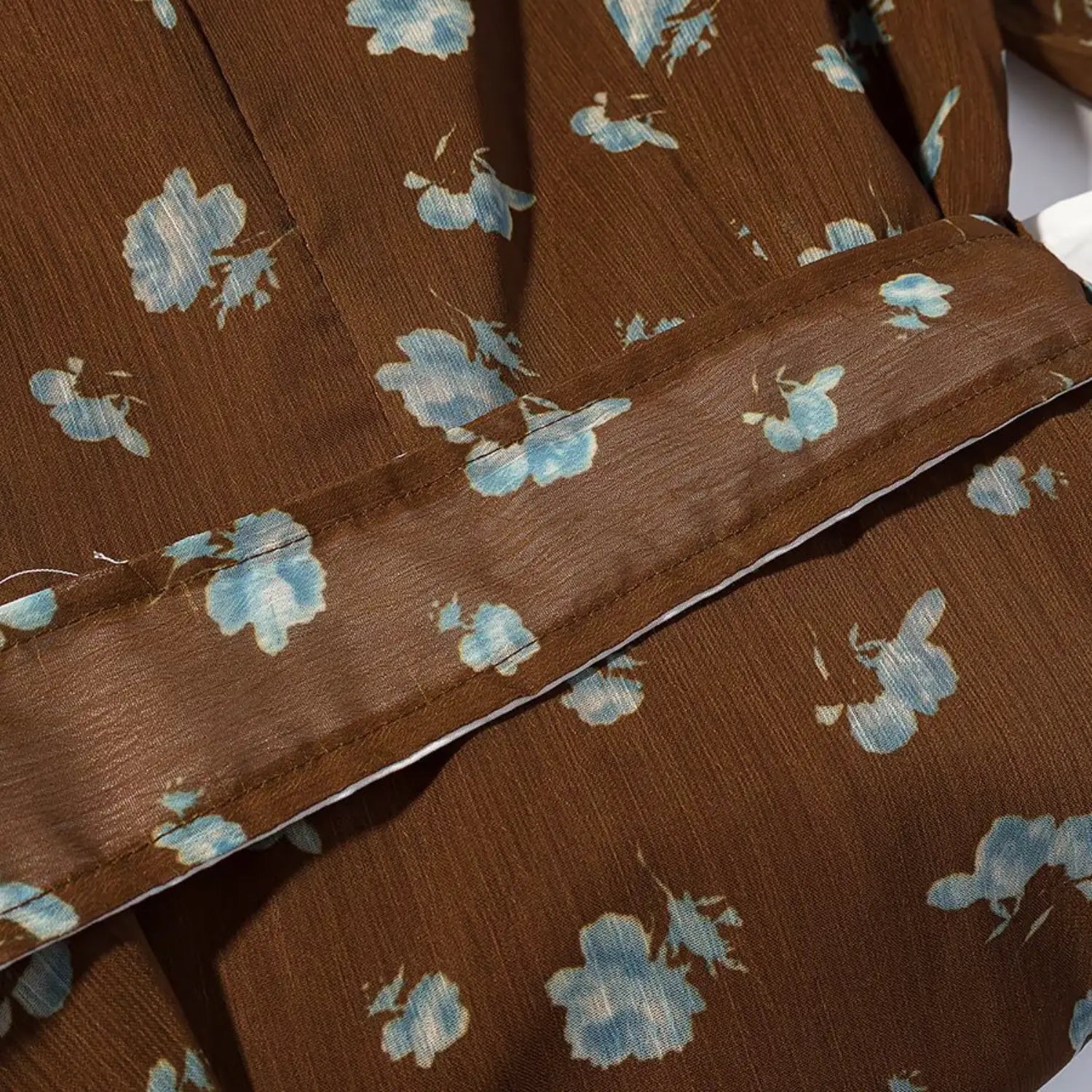 Skirt side waist connecting seam detail, crinkled matte chiffon with scattered light blue flower print