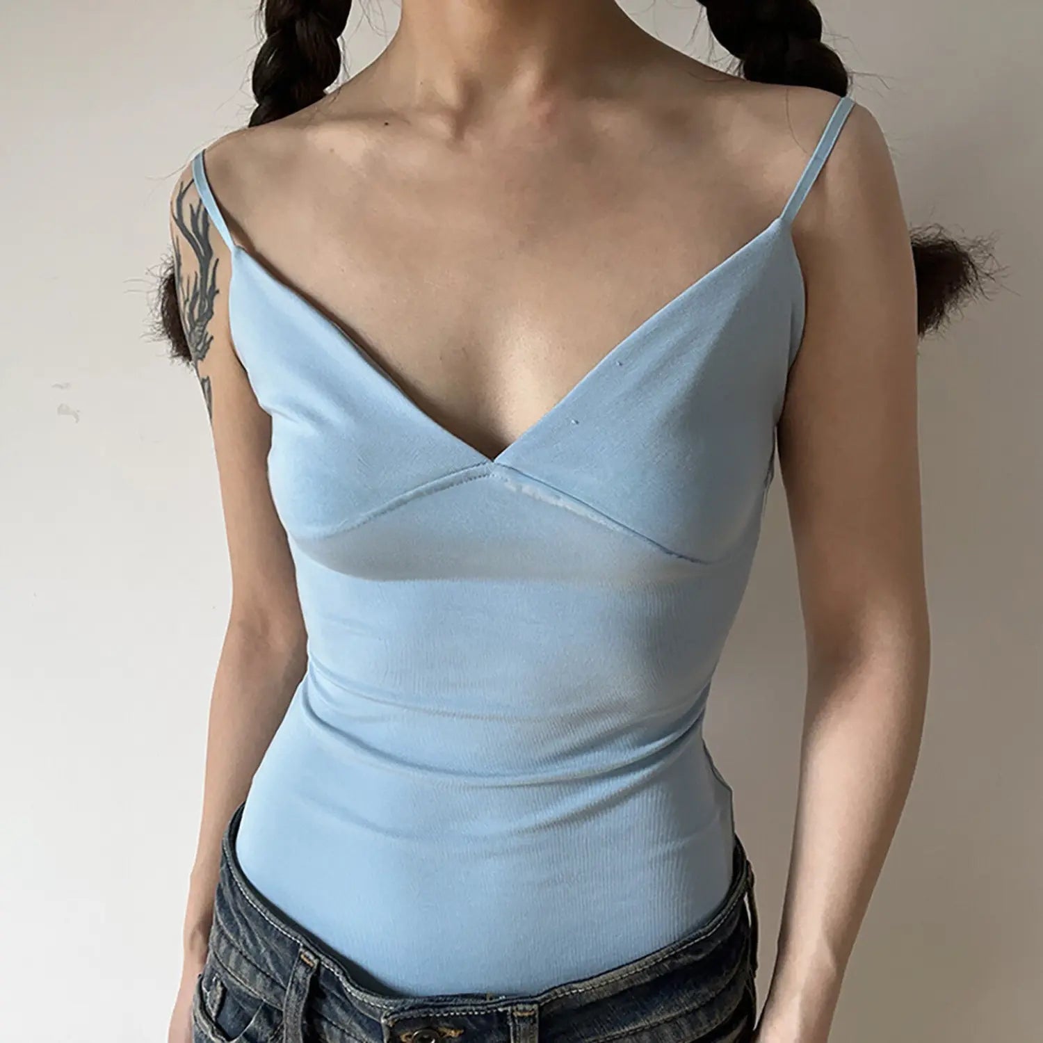 Front shot soft sky blue ribbed cami singlet, deep wrap V neck bodycon waist ruched design thin spaghetti strap women basic layering tank