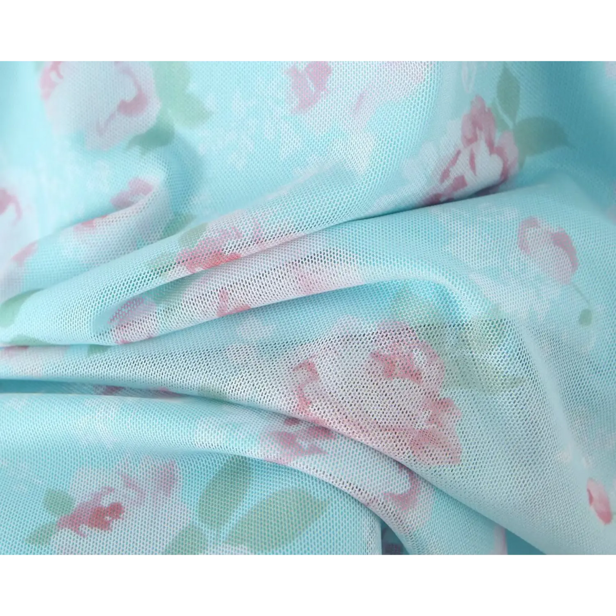 Macro texture shot of skyblue rose floral printed soft mesh dress fabric