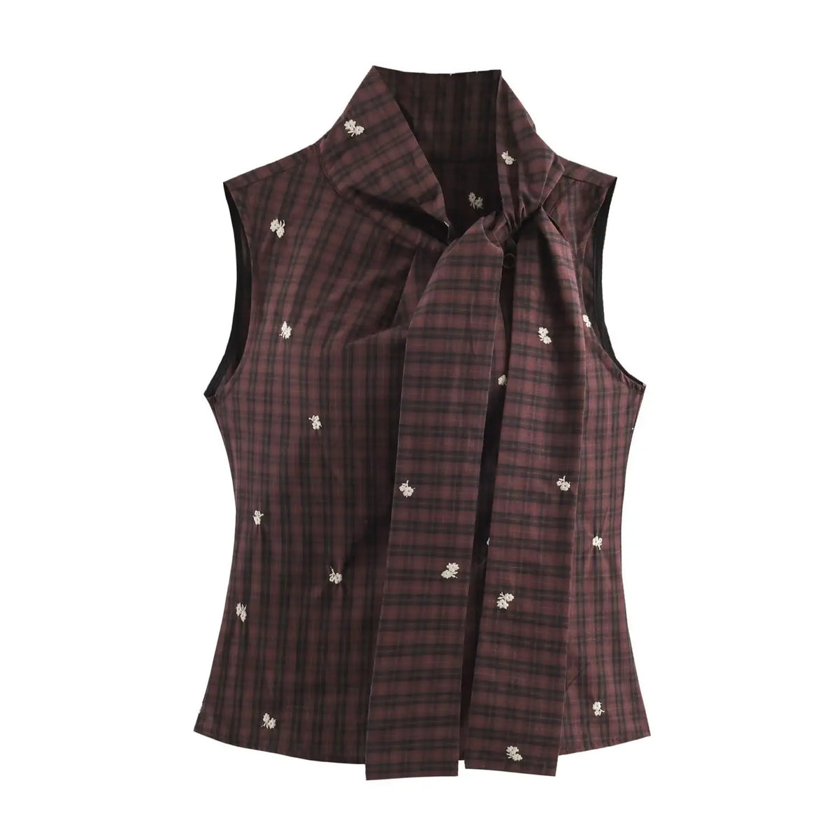 Front view of sleeveless plaid vest with long neck tie tied in a bow at collar and white floral embroidery