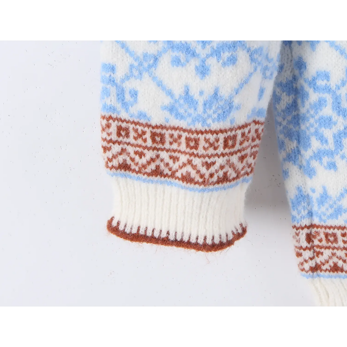 Close-up of ribbed cuff and fair isle trim