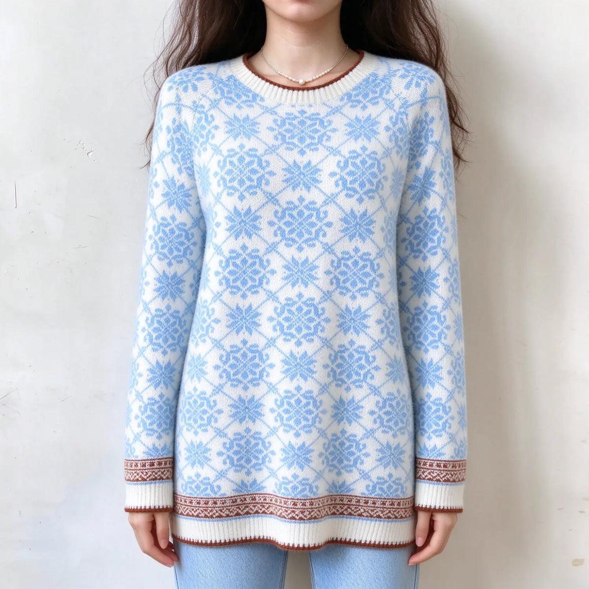 Model wearing snowflake fair isle crew neck sweater, front view