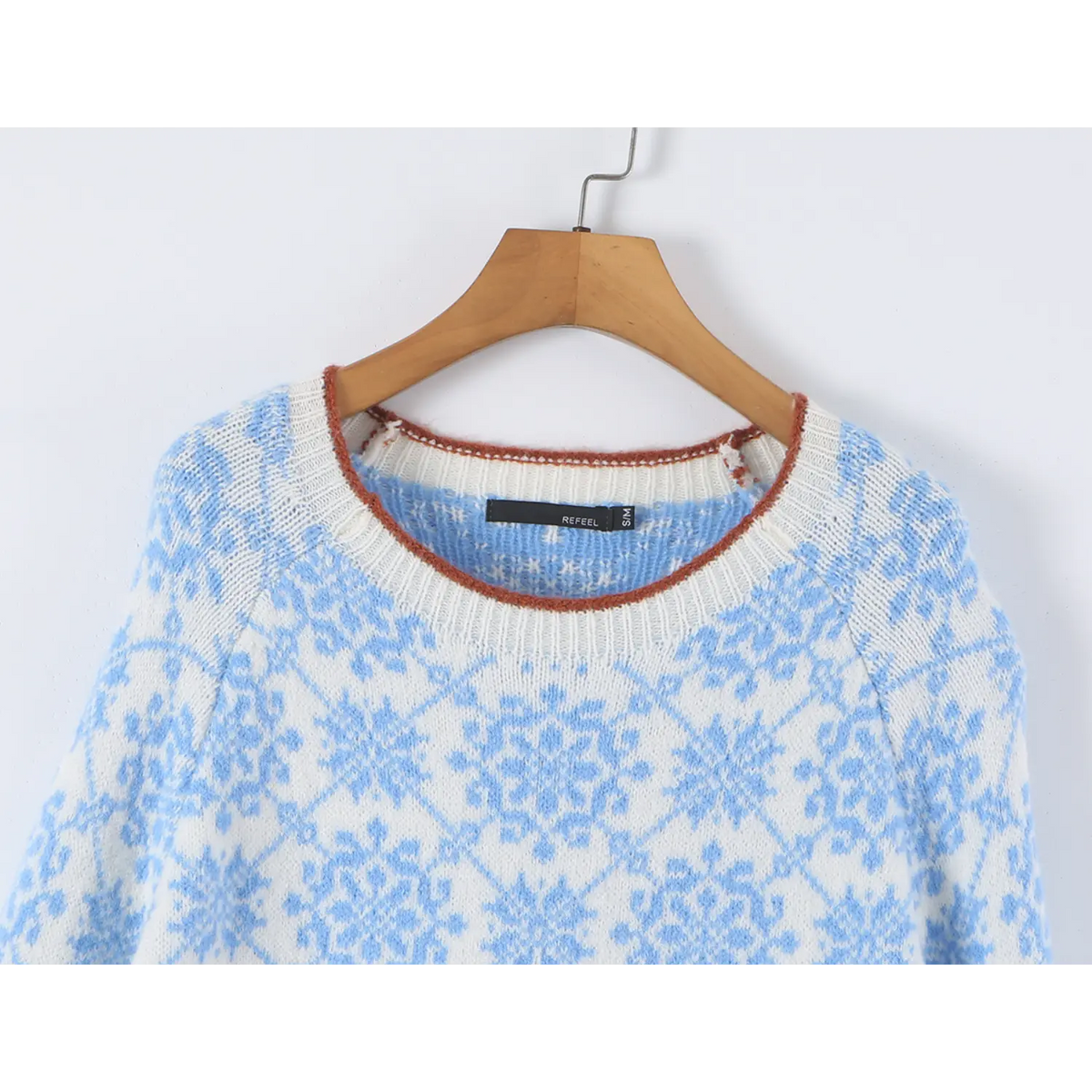 Close-up of crew neck and inner label