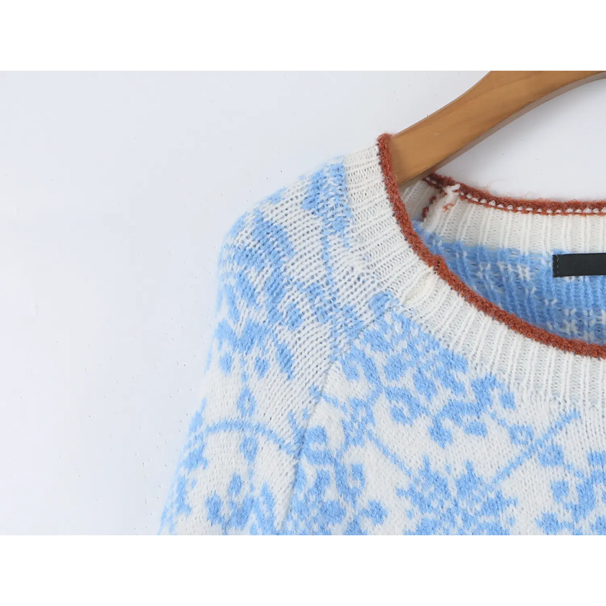 Close-up of raglan shoulder detail
