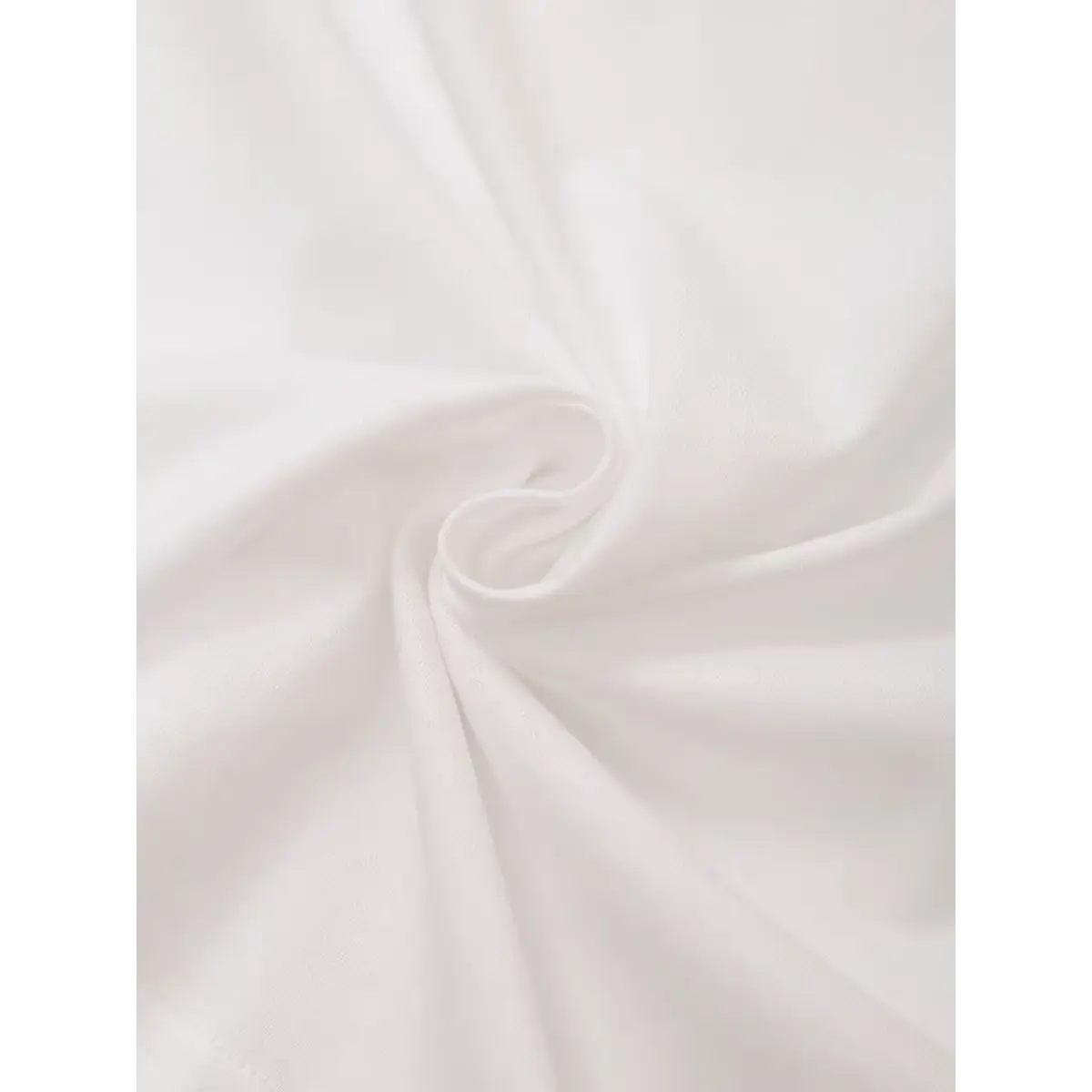 Twisted folded lightweight cotton jersey texture close up plain white tee