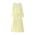 Front full flat lay cream yellow long sleeve maxi dress, ruffle crew neck, diagonal ruched slim bodice, high waist flowy pleated skirt, fairy casual vacation dress