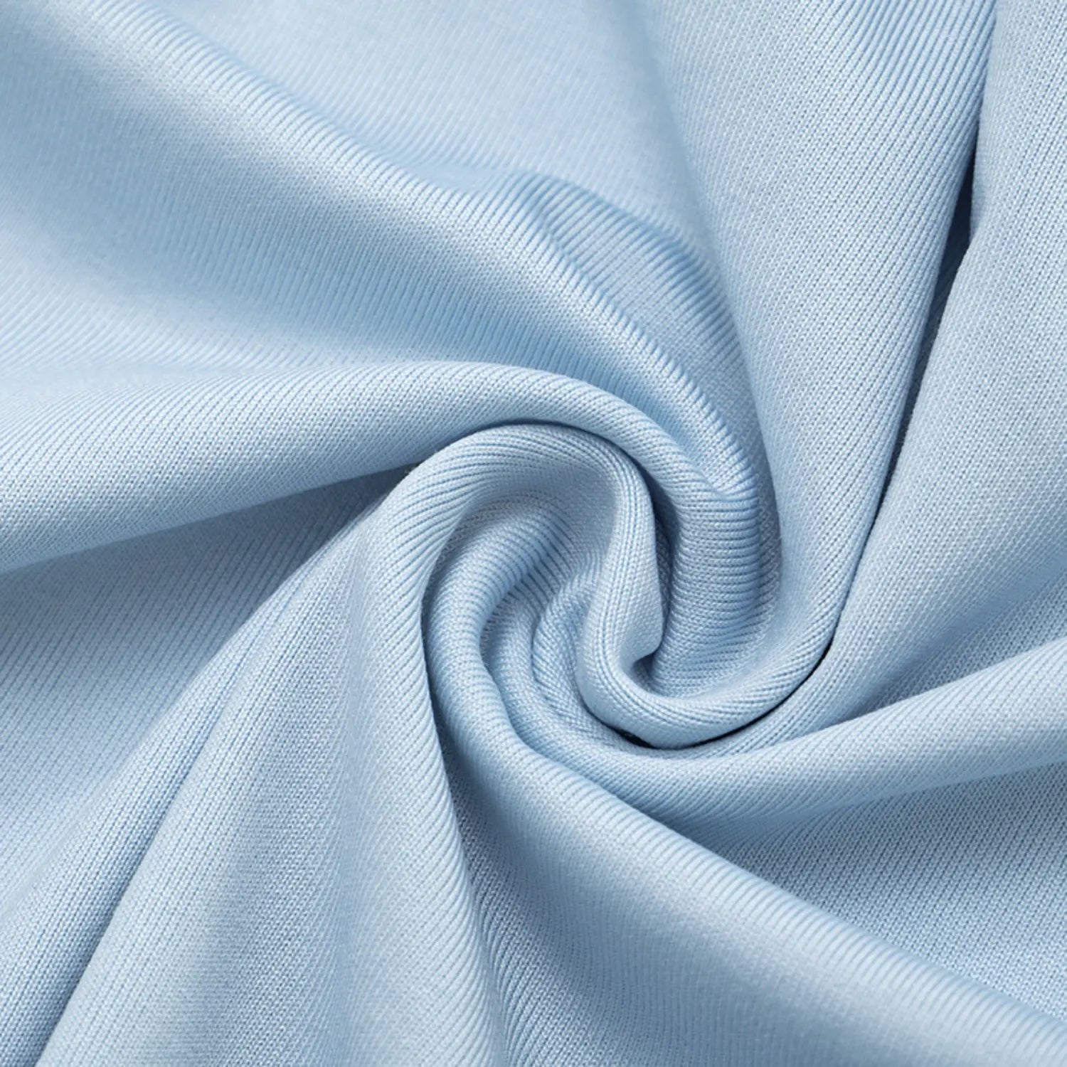 Macro close-up twisted texture shot of light sky blue smooth stretch jersey knit fabric, fine tight ribbed weave, soft drapey lightweight material with matte subtle sheen, flexible wrinkle-resistant textile