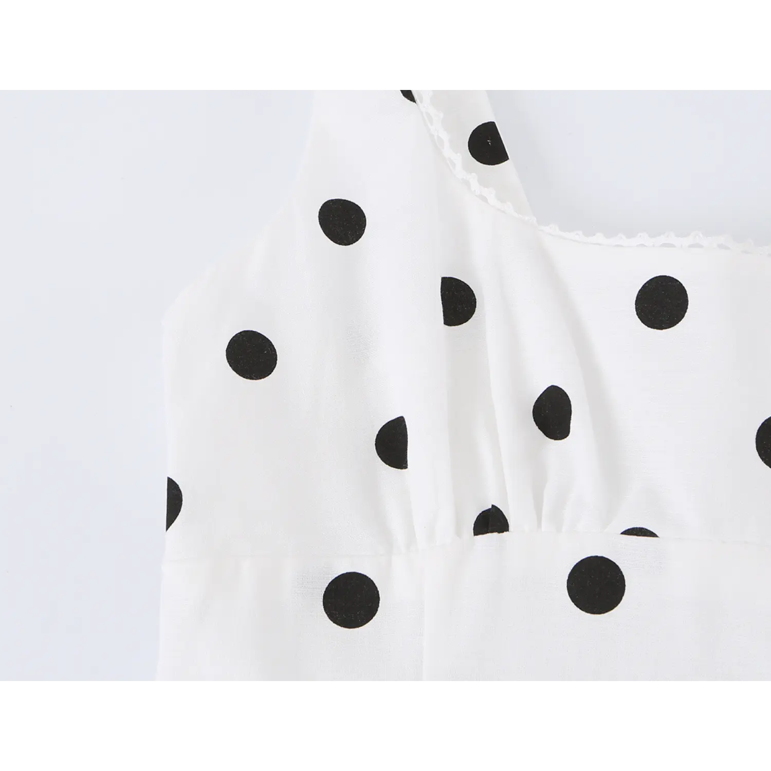 Square neck polka dot cami dress neck lace trim macro flat shot, scalloped hollow lace edge woven fabric overlock stitching detail