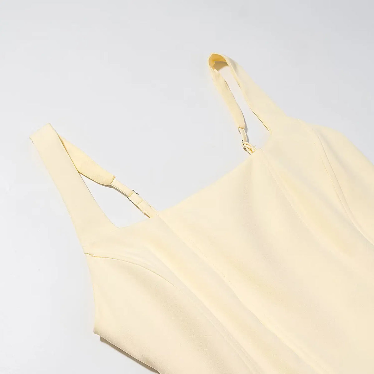 Close-up of adjustable strap and boned bodice stitching