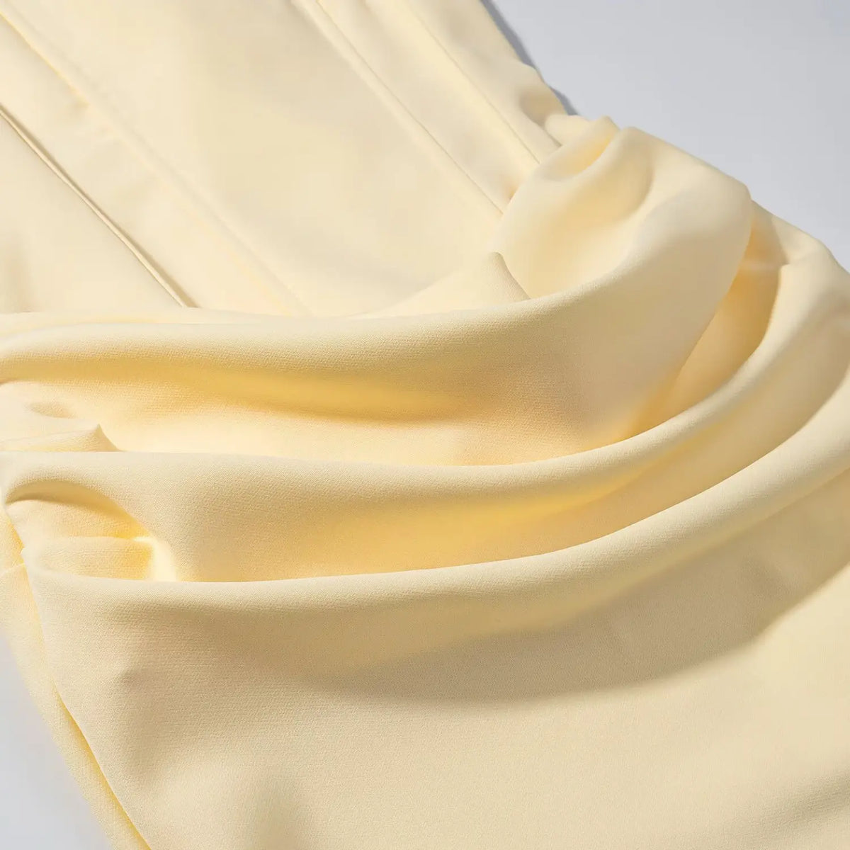 Close-up of draped skirt fabric