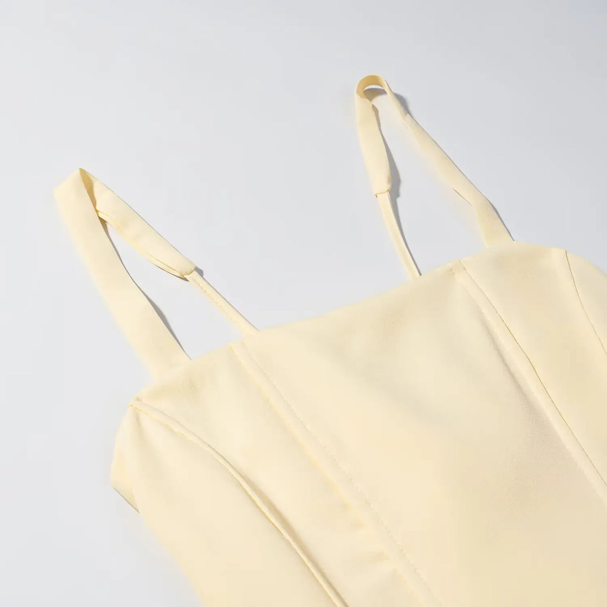 Close-up of adjustable strap and boned bodice stitching