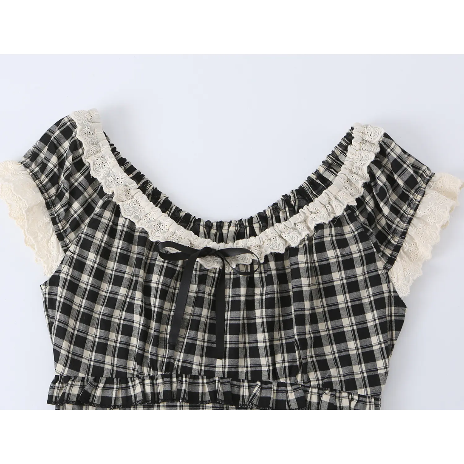 Full upper shot square neck plaid blouse, off-white hollow embroidery lace ruffle trim, center front black ribbon bow, elastic cap short sleeves