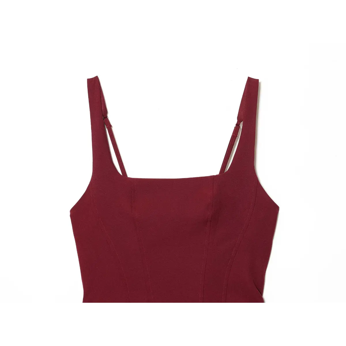 Close-up of the square neckline and adjustable straps on a wine red corset dress, showing the corset-style vertical seams.
