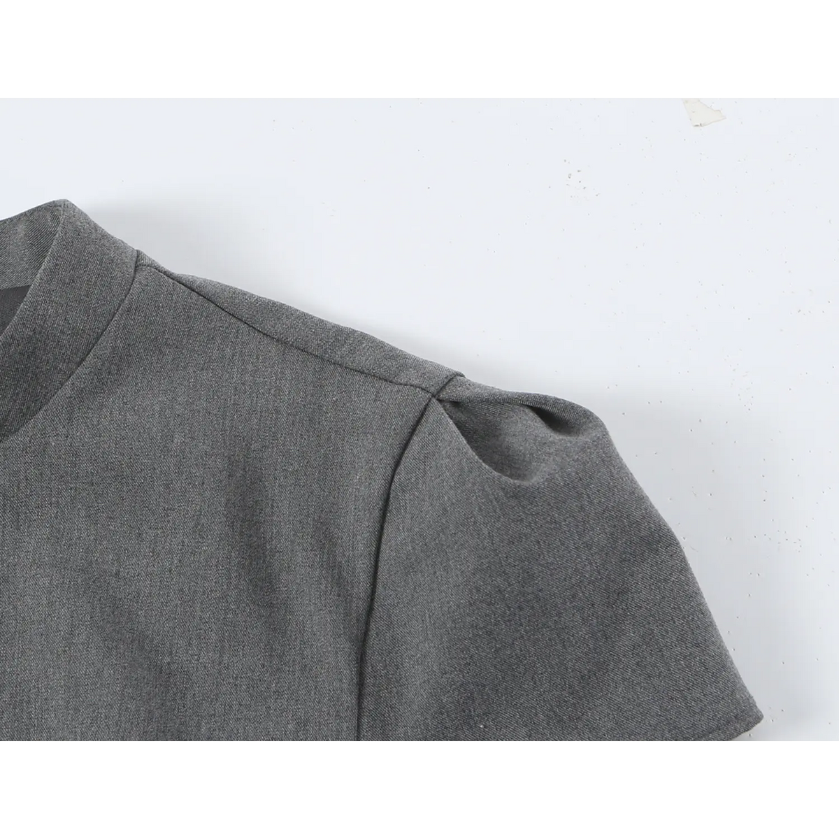 Close-up of petal puff sleeve and shoulder seam