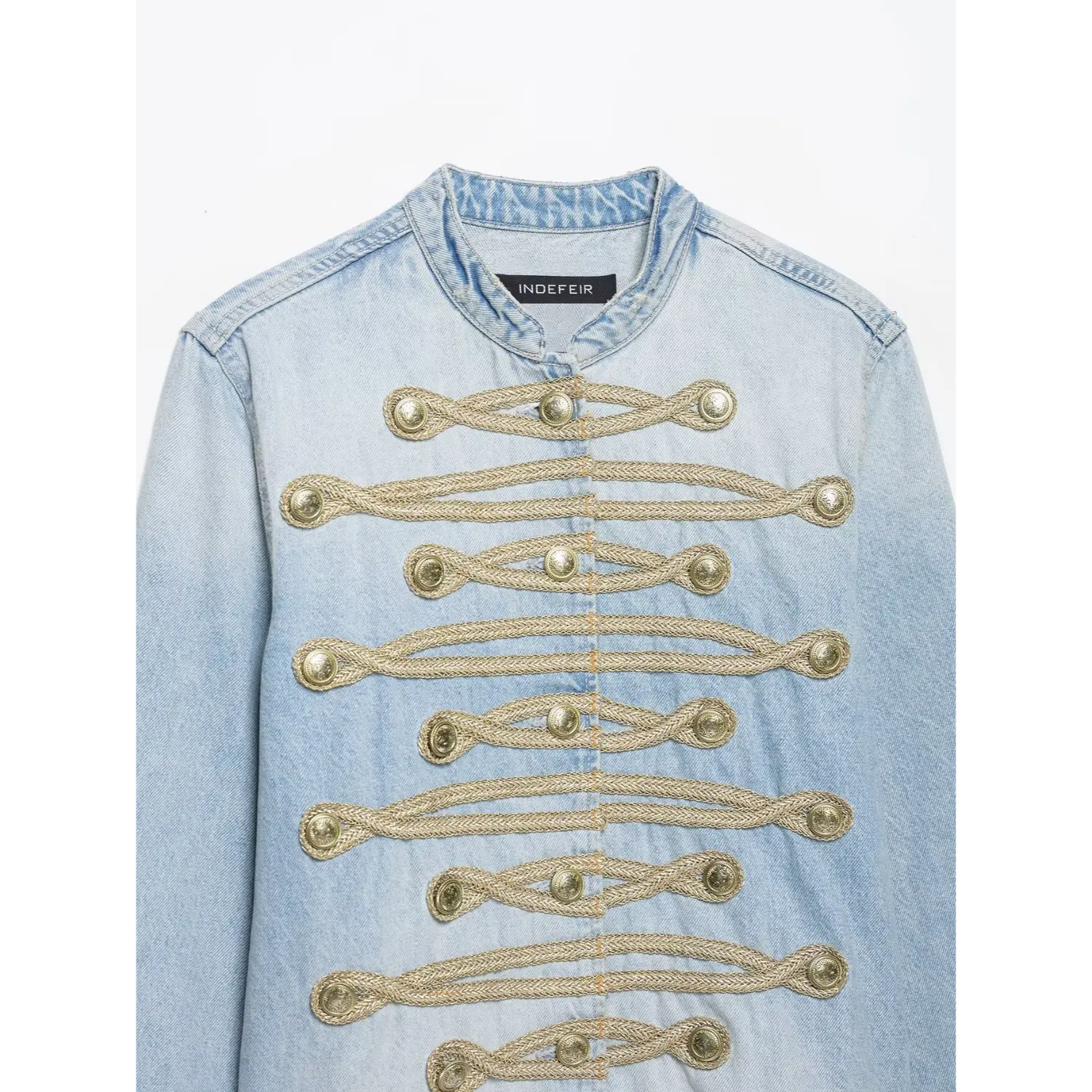 Full front detail stand collar light wash denim jacket featuring decorative gold braiding and antique brass buttons