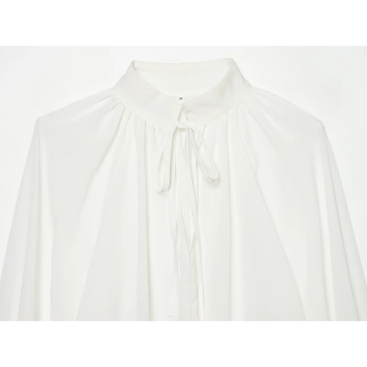 Close-up of stand collar and front tie ribbon
