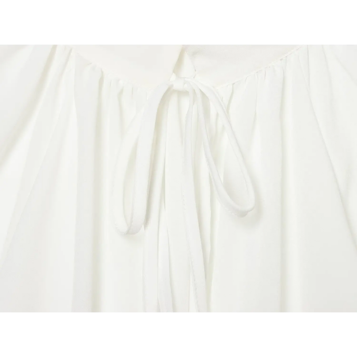 Close-up of tie ribbon ends