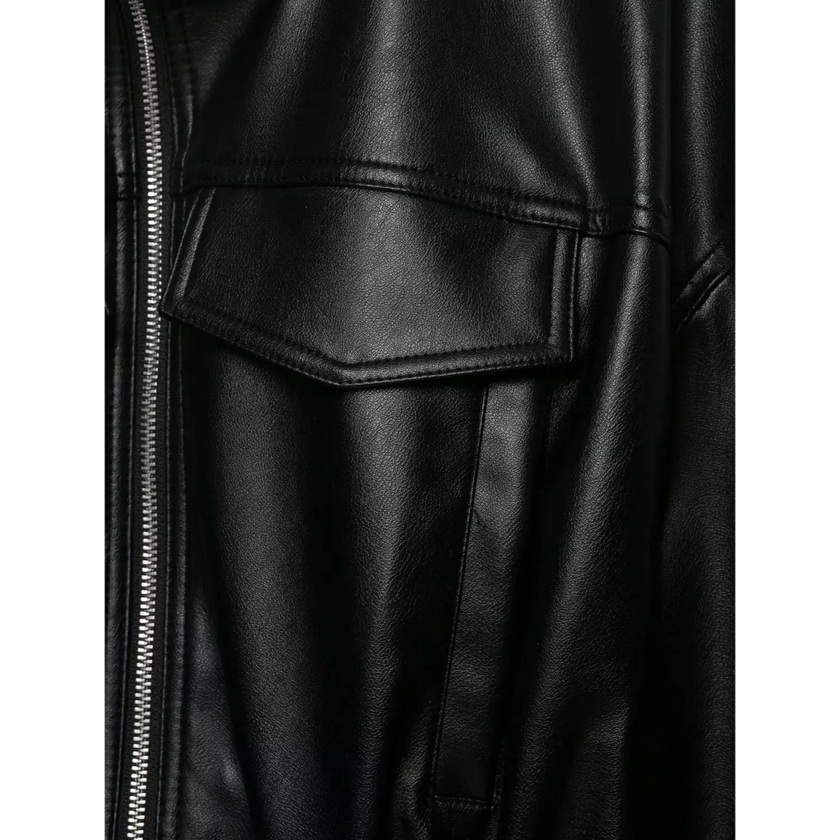 Close-up of black chest flap pocket and side seam