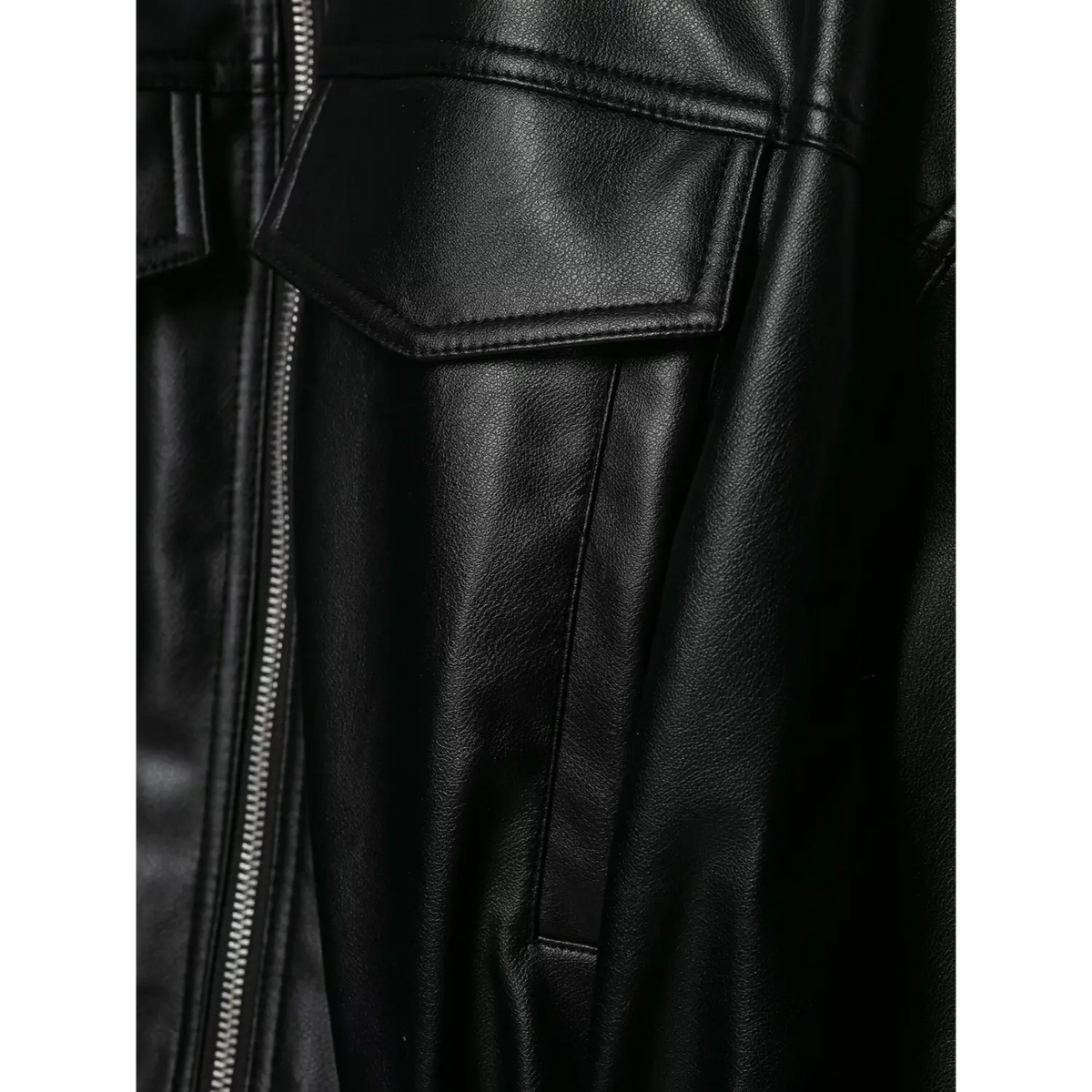 Close-up of black chest flap pocket and side seam