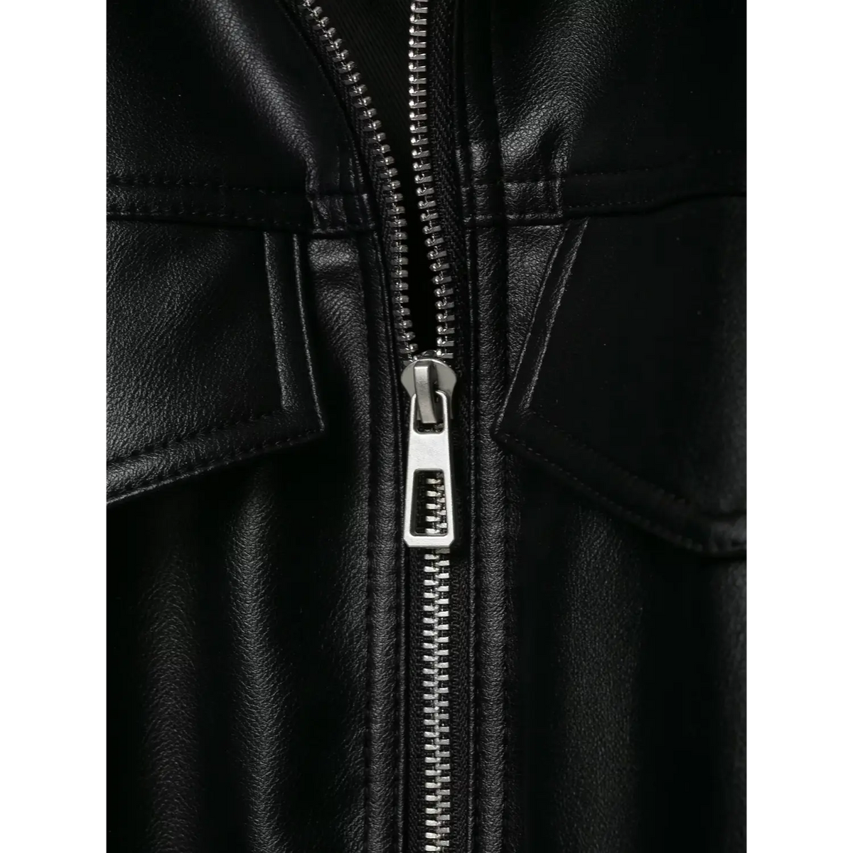 Close-up of black metal zipper pull