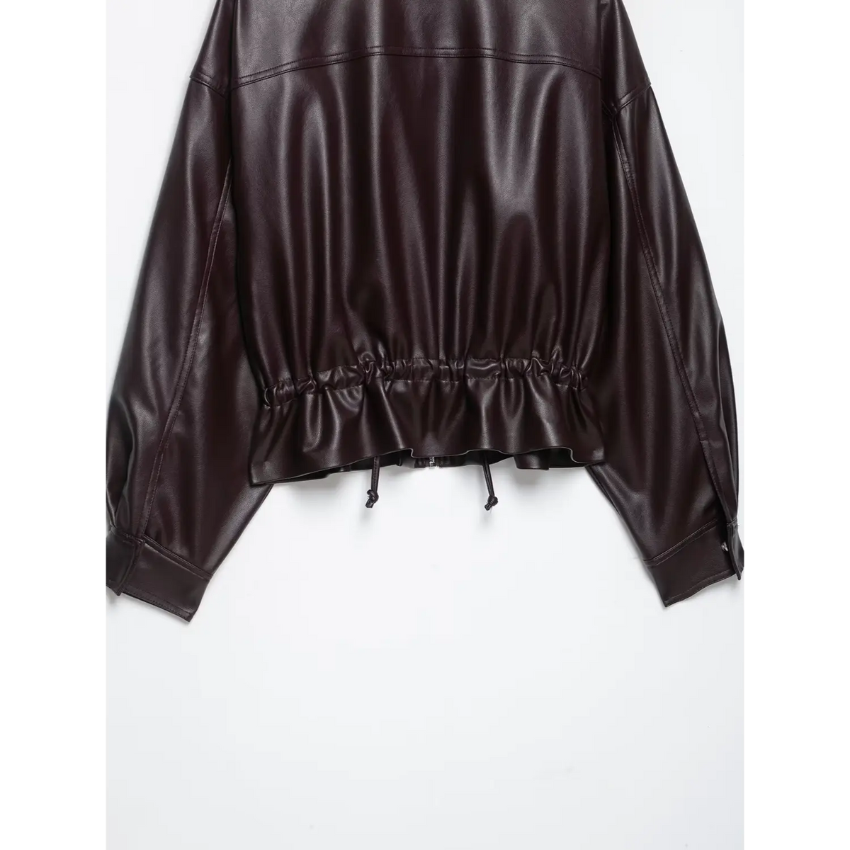 Close-up of burgundy back elasticated hem and drawstring