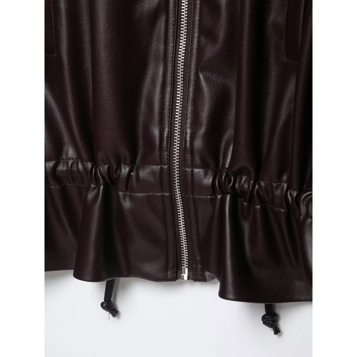 Close-up of burgundy elasticated hem and drawstring