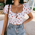 Beach front model photo white strawberry printed square neck puff sleeve tie front cropped blouse