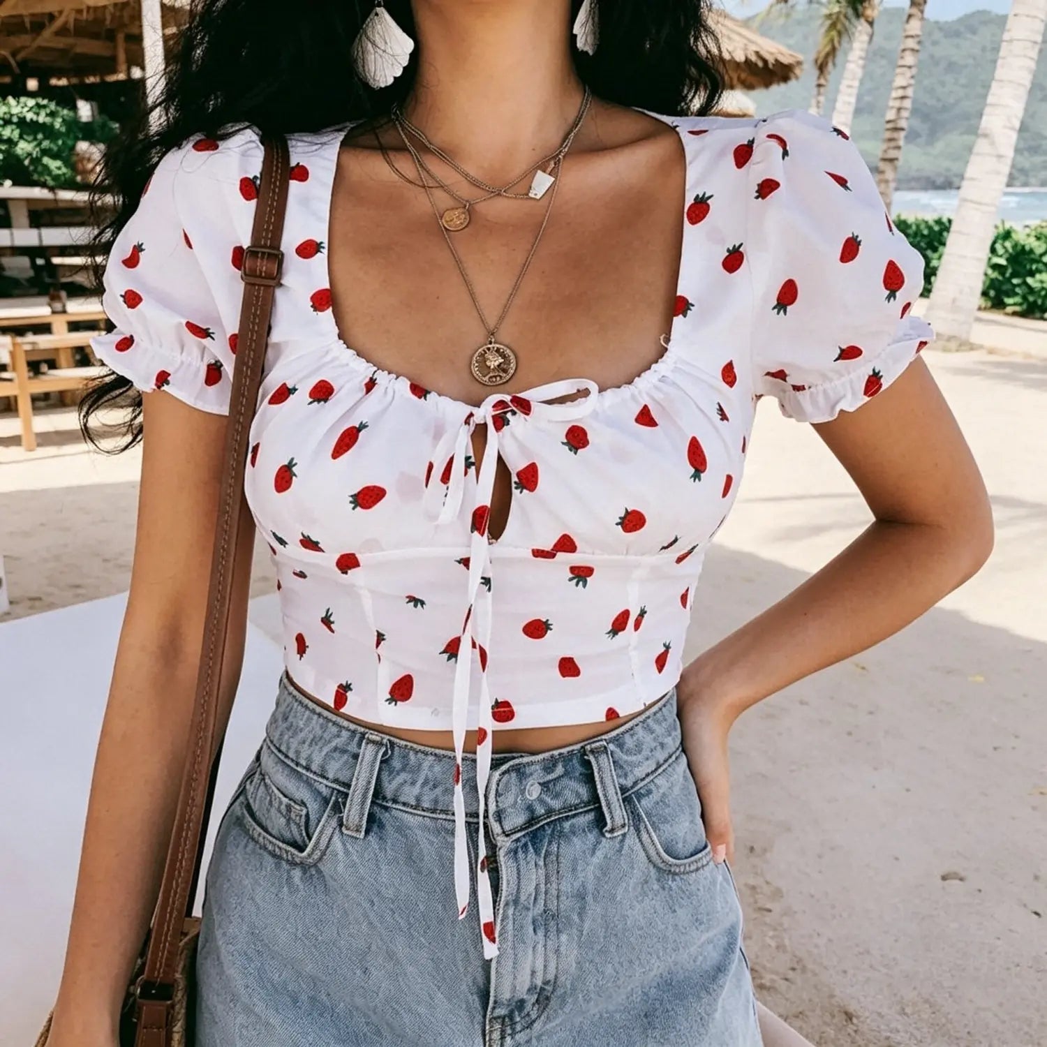Beach front model photo white strawberry printed square neck puff sleeve tie front cropped blouse