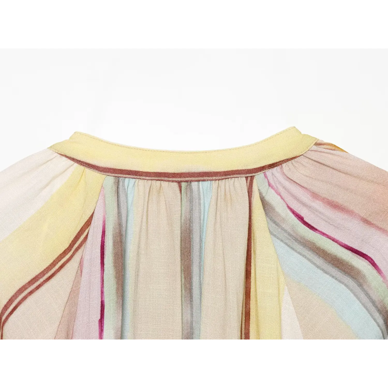 Close‑up of back collar and gathered yoke detail on colorful vertical stripe midi dress