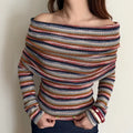 Model wearing stripe off shoulder cowl neck fitted knit top, hands at hem view