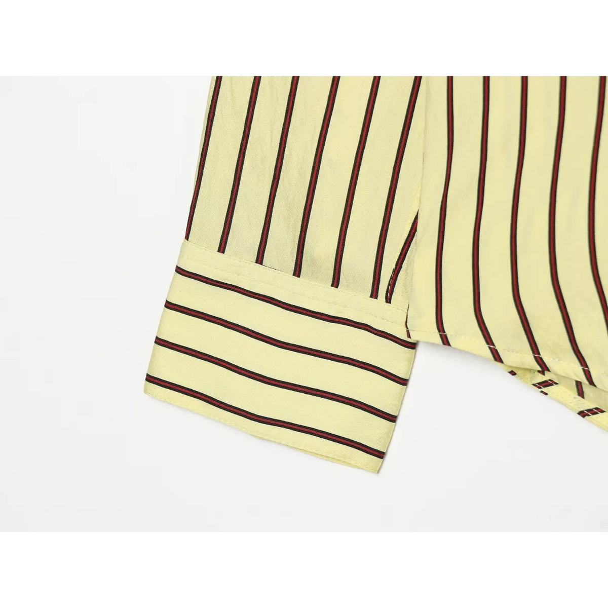 Close-up of horizontally striped wide cuff