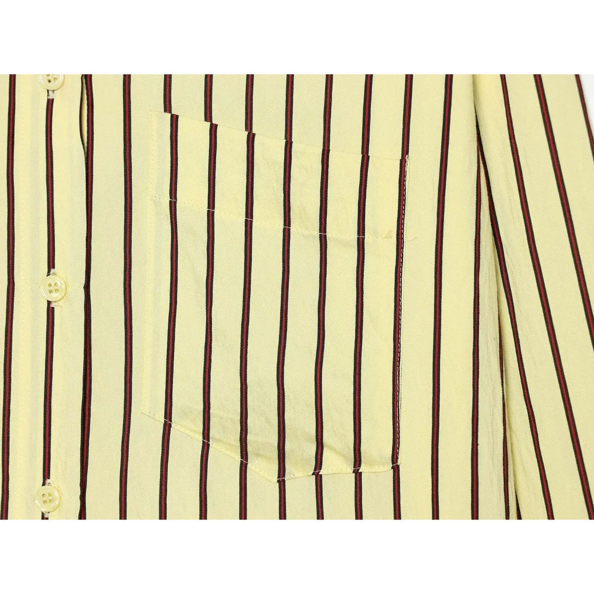Close-up of chest patch pocket and placket buttons