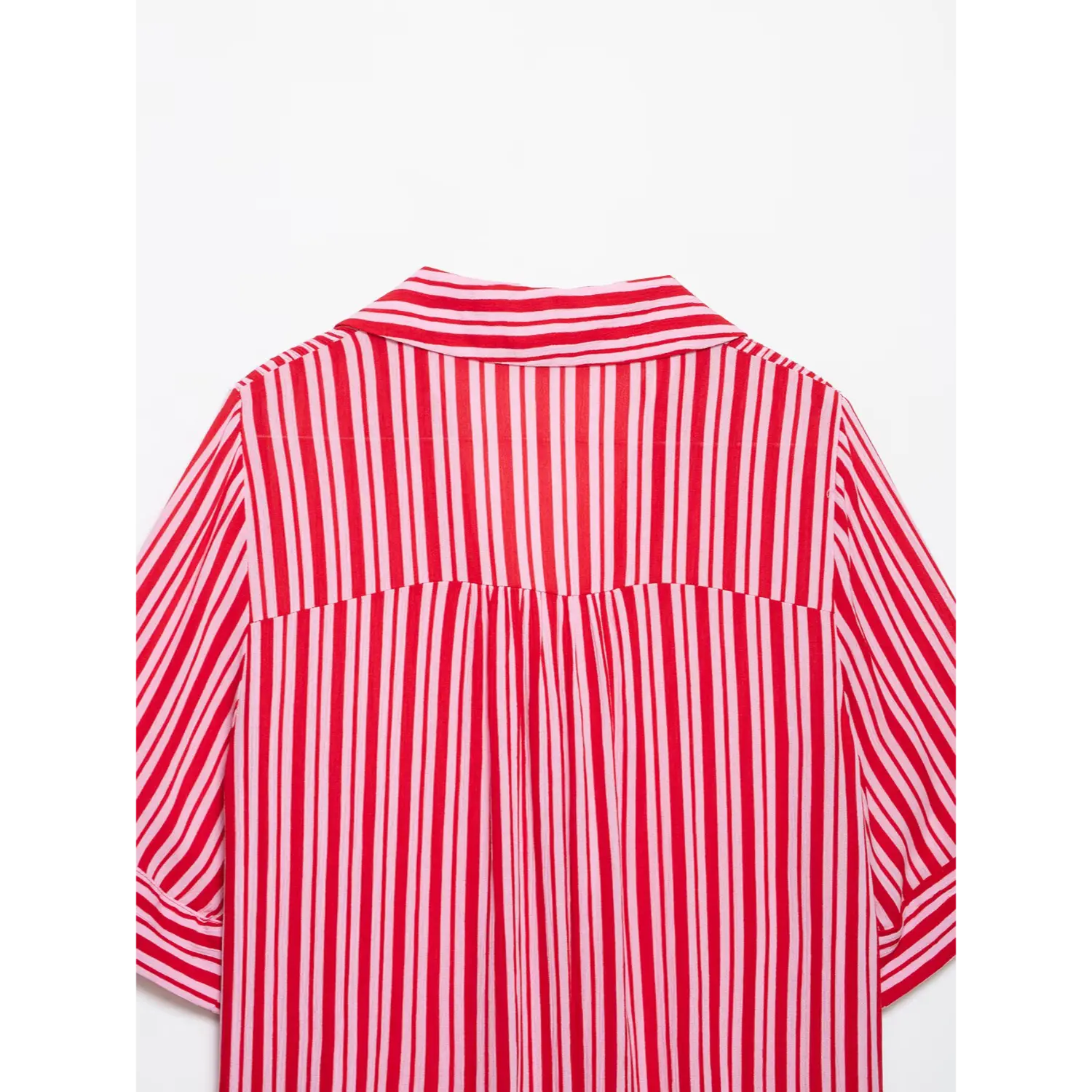 Full lower back shot, straight finished hem and lightweight crinkled stripe material