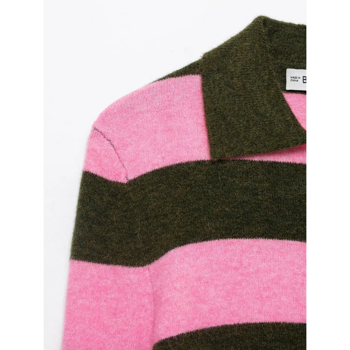 Close-up of shoulder seam and polo collar