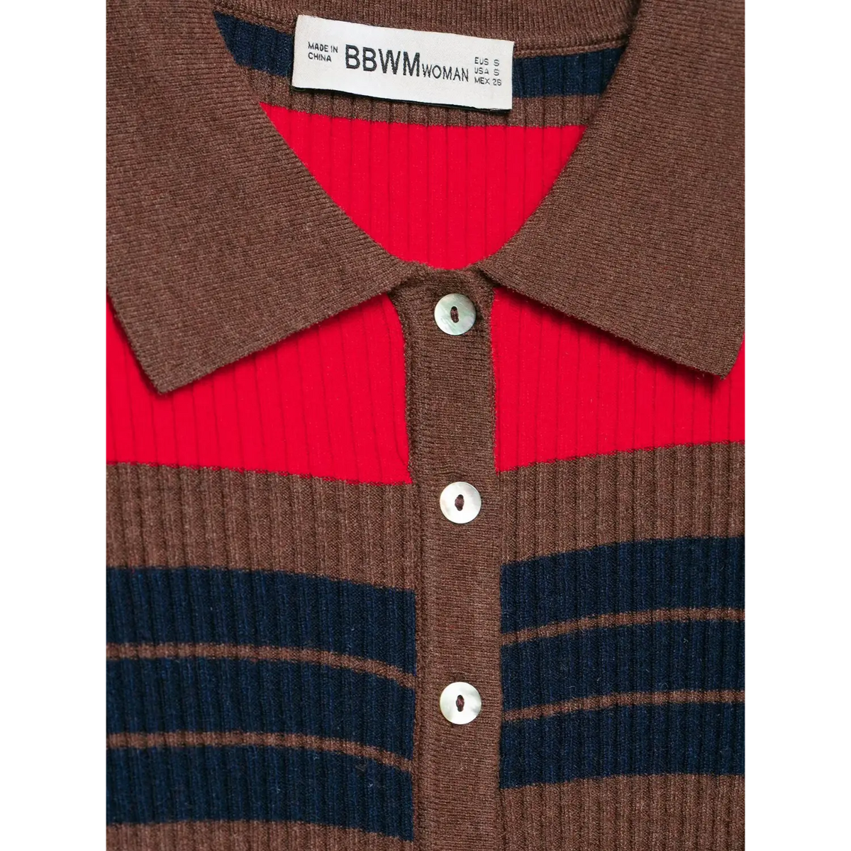 Close-up of neck label and buttons