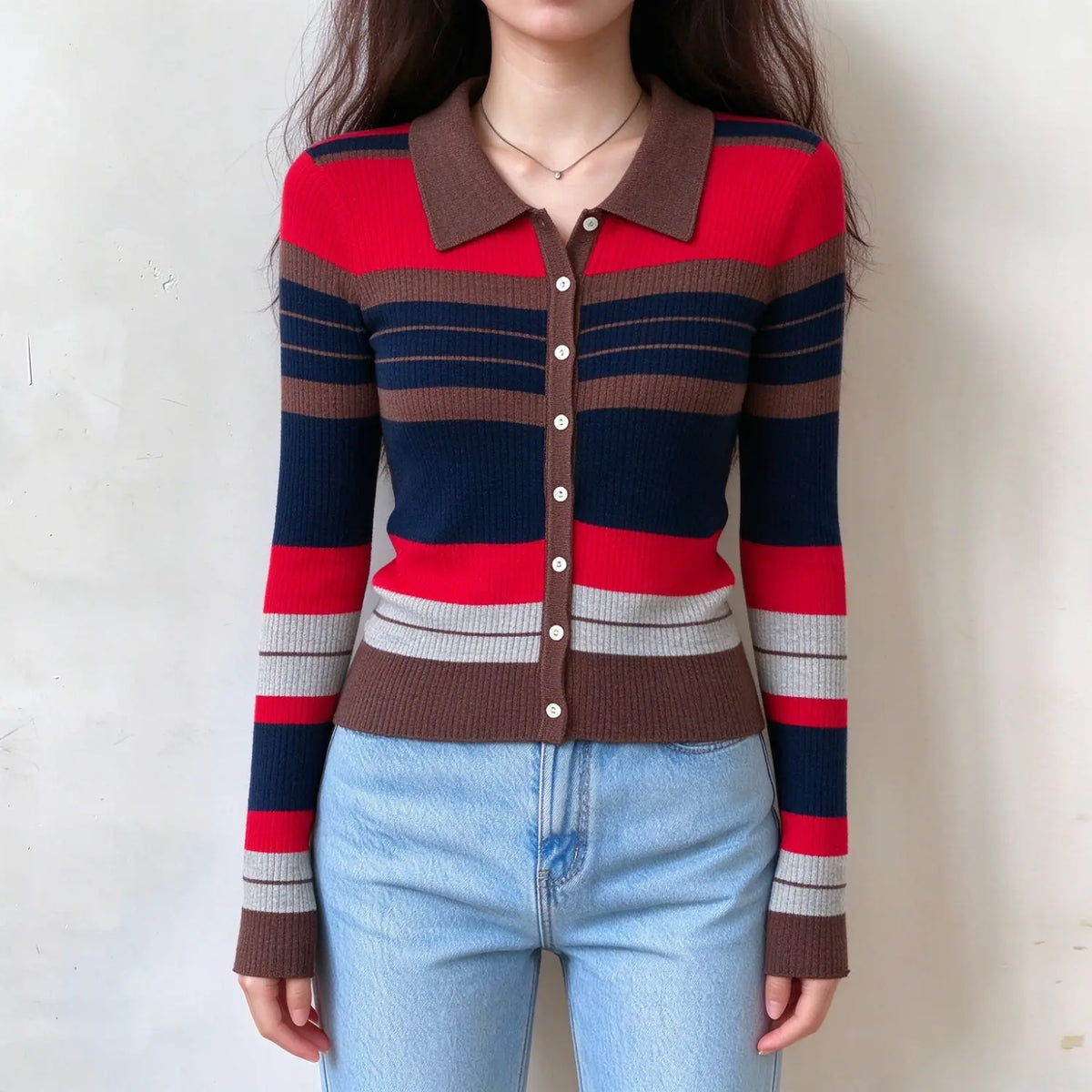 Model wearing striped collared button ribbed knit cardigan with jeans, front view