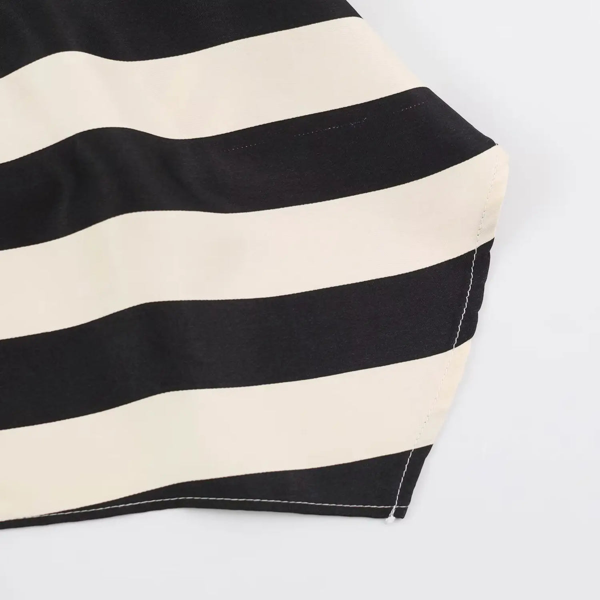Close-up of handkerchief hem corner stitching
