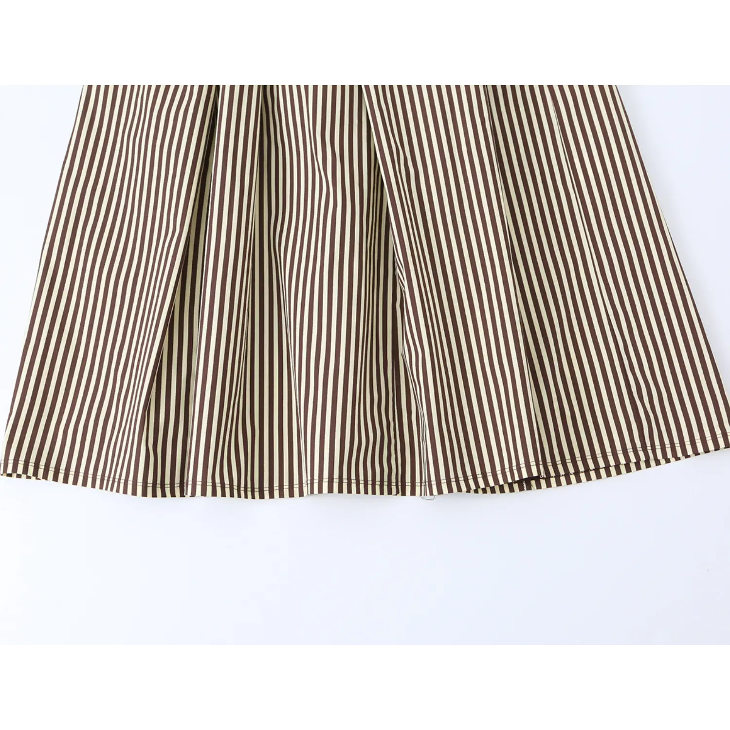 Flowy skirt hem of brown white vertical stripe midi dress